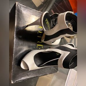 Black and white heels. Size 8 1/2. Paper fox